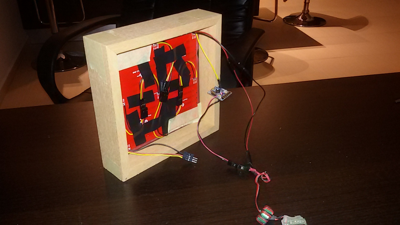 electronics assembly in the wooden frame